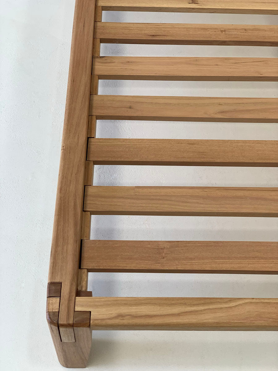 Close-up of Japanese joinery on Castle Joint hardwood bed frame