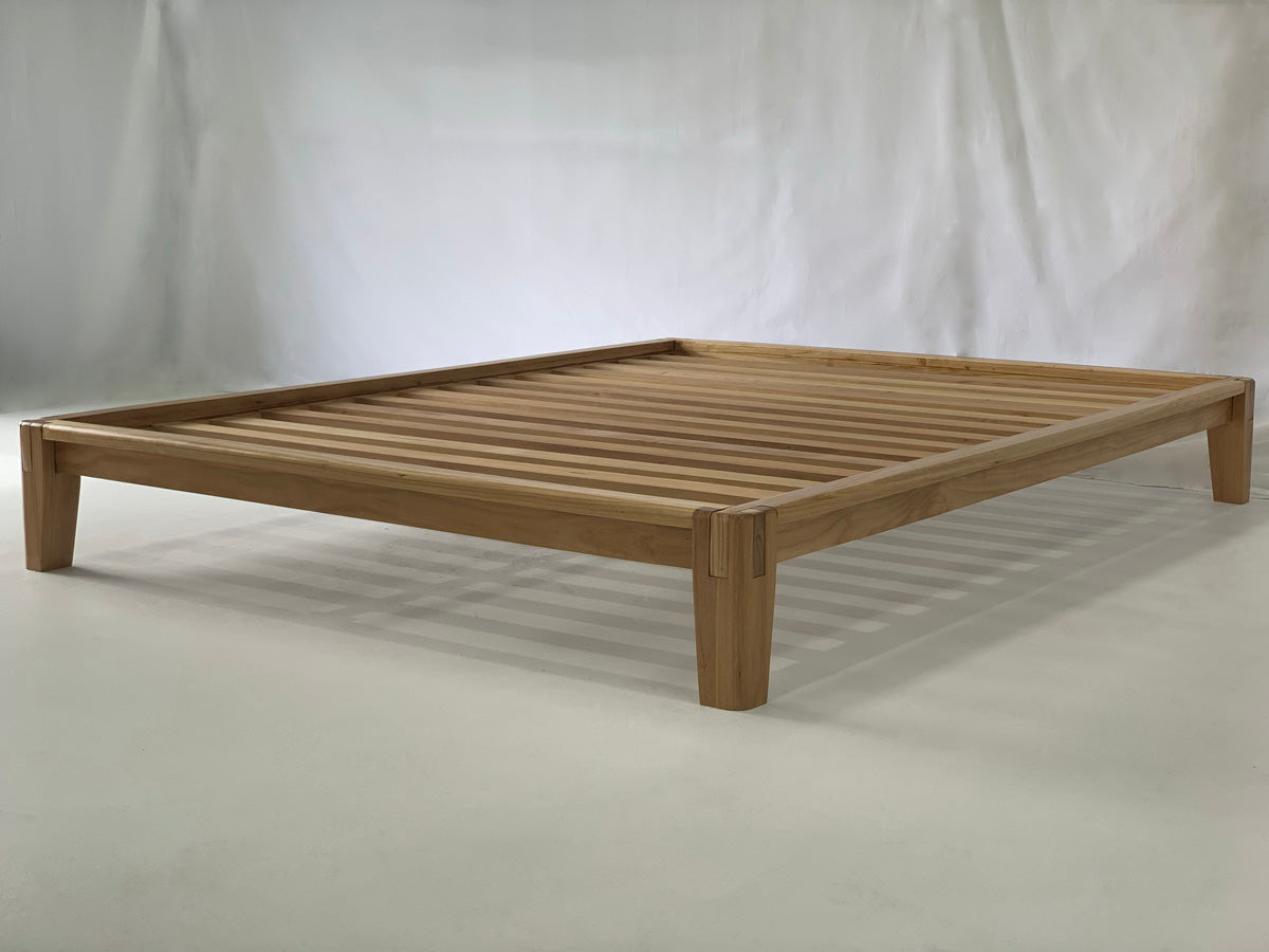 Side view of Castle Joint solid Blackbutt timber bed frame